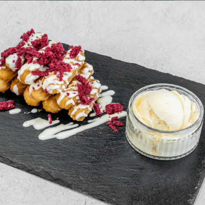crispy churros with a creamy sauce served at room for dessert Toryglen